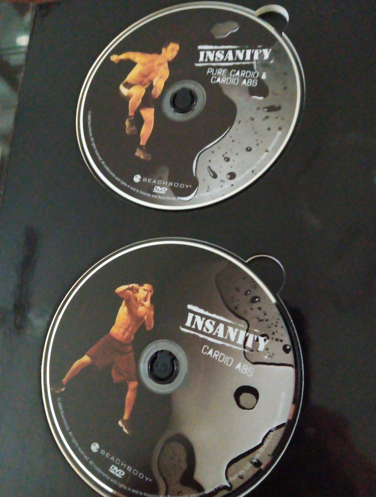 Insanity CD Workout Set Everything You Need To Get In Shape