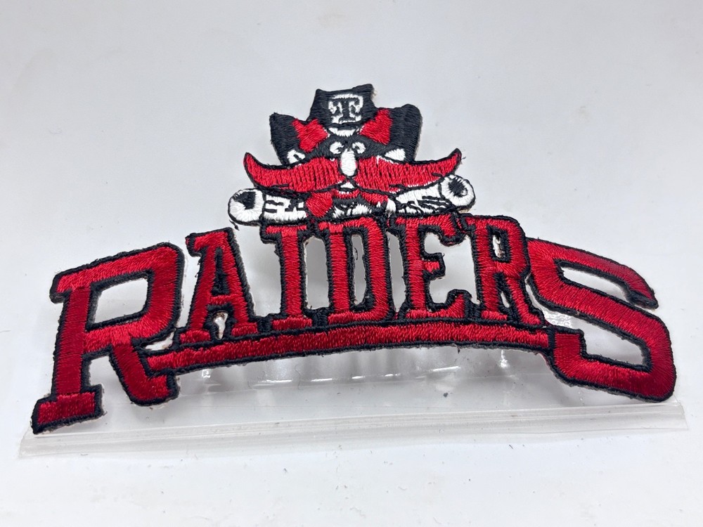 RAIDERS  USED SEW ON NAME PATCH  TAG  2 X 4