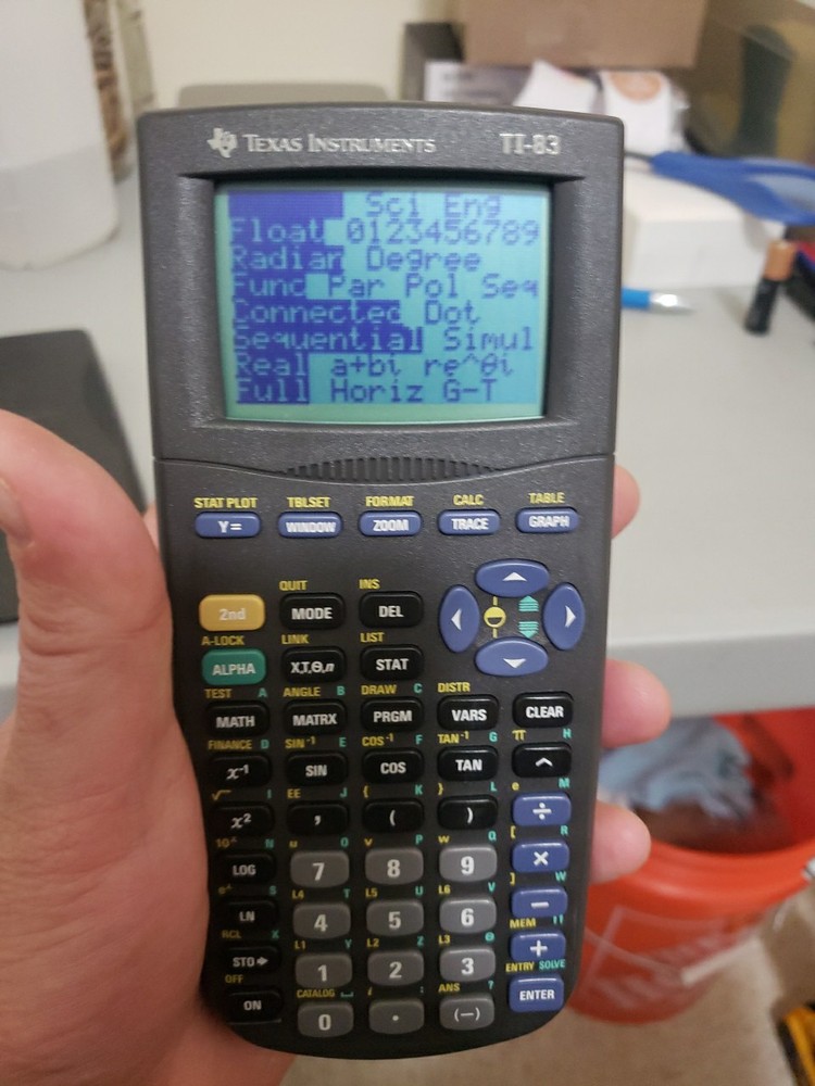 Texas Instruments TI-83 Handheld Graphing Calculator