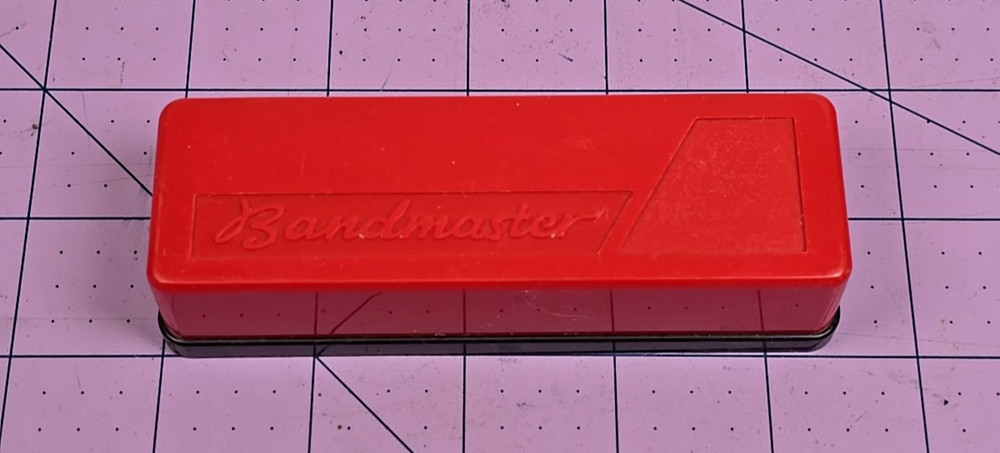 Vintage Bandmaster red plastic harmonica case - East Germany