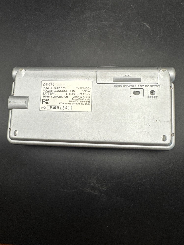 Vintage Sharp Wizard OZ-730 Silver Handheld Portable Electronic Organizer