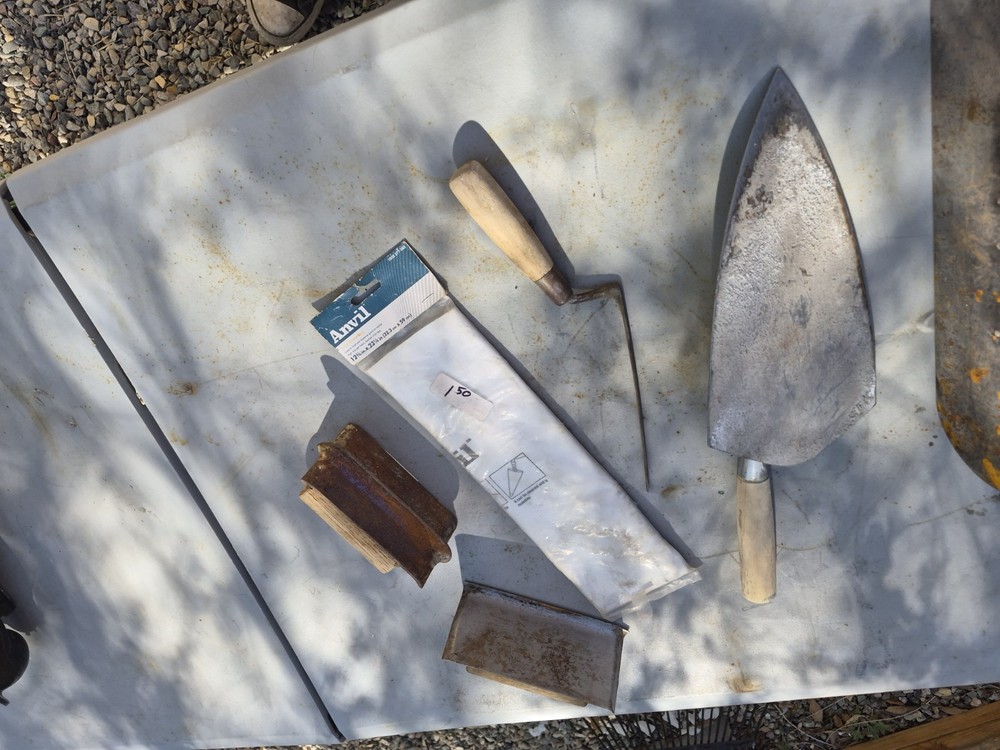 Masonry Tools And Notched Towels