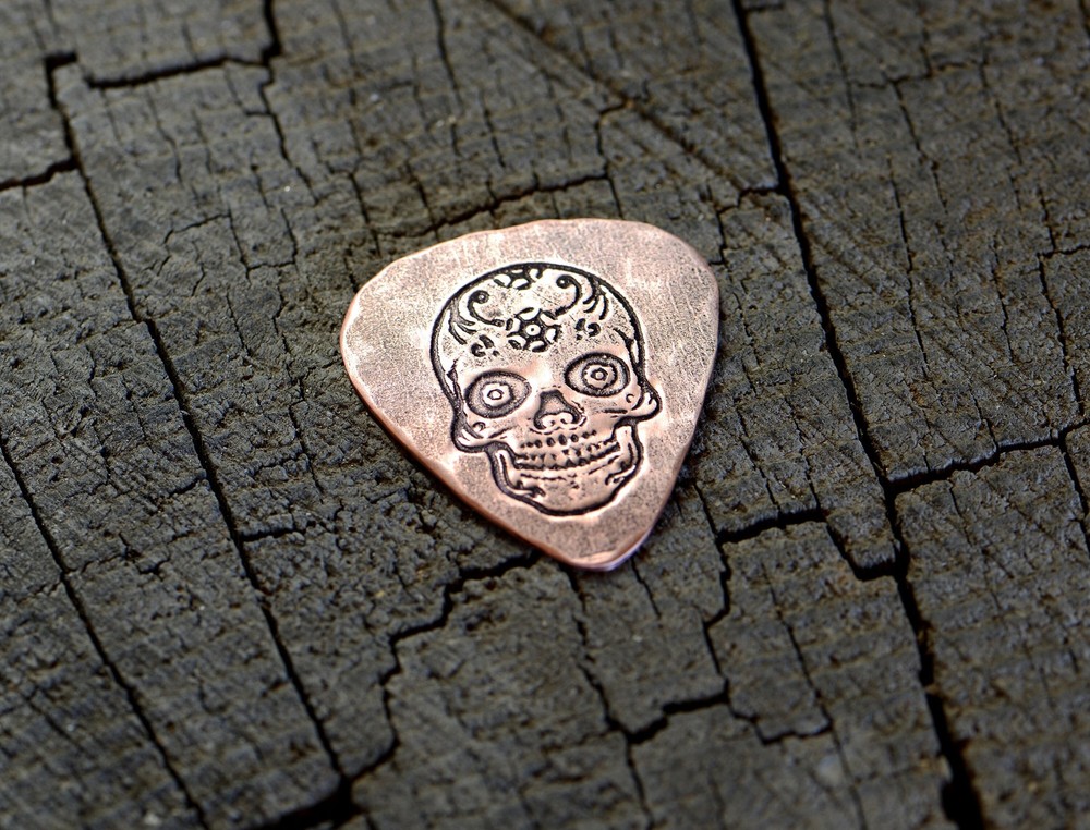 playable copper guitar pick with sugar skull - NicisPicks Original