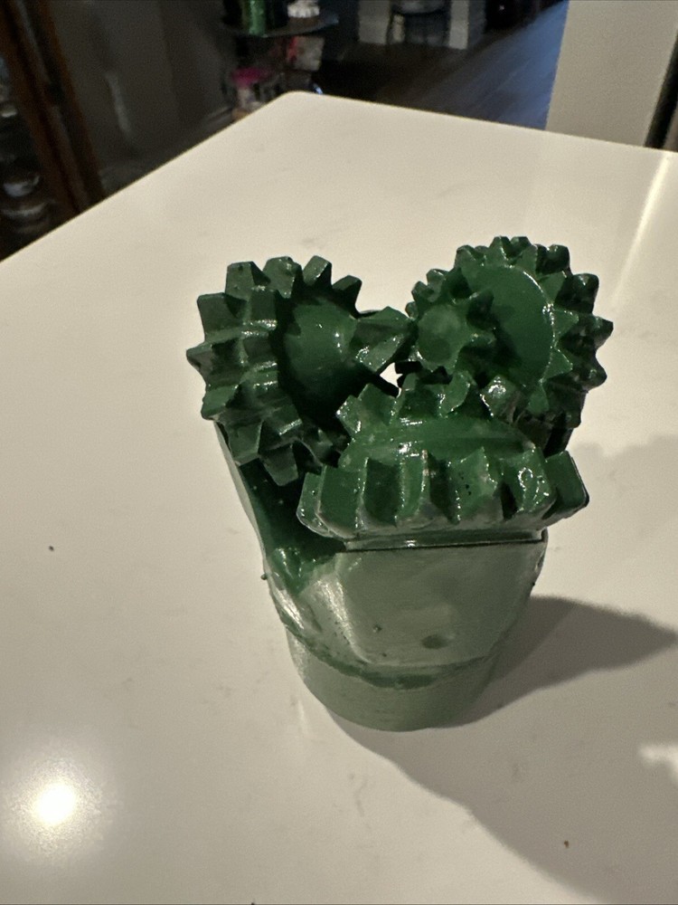Tricone drill bit