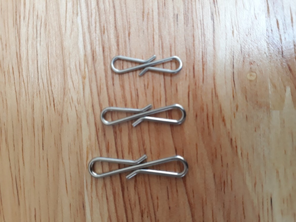 Double link clip, twin link, double connector link