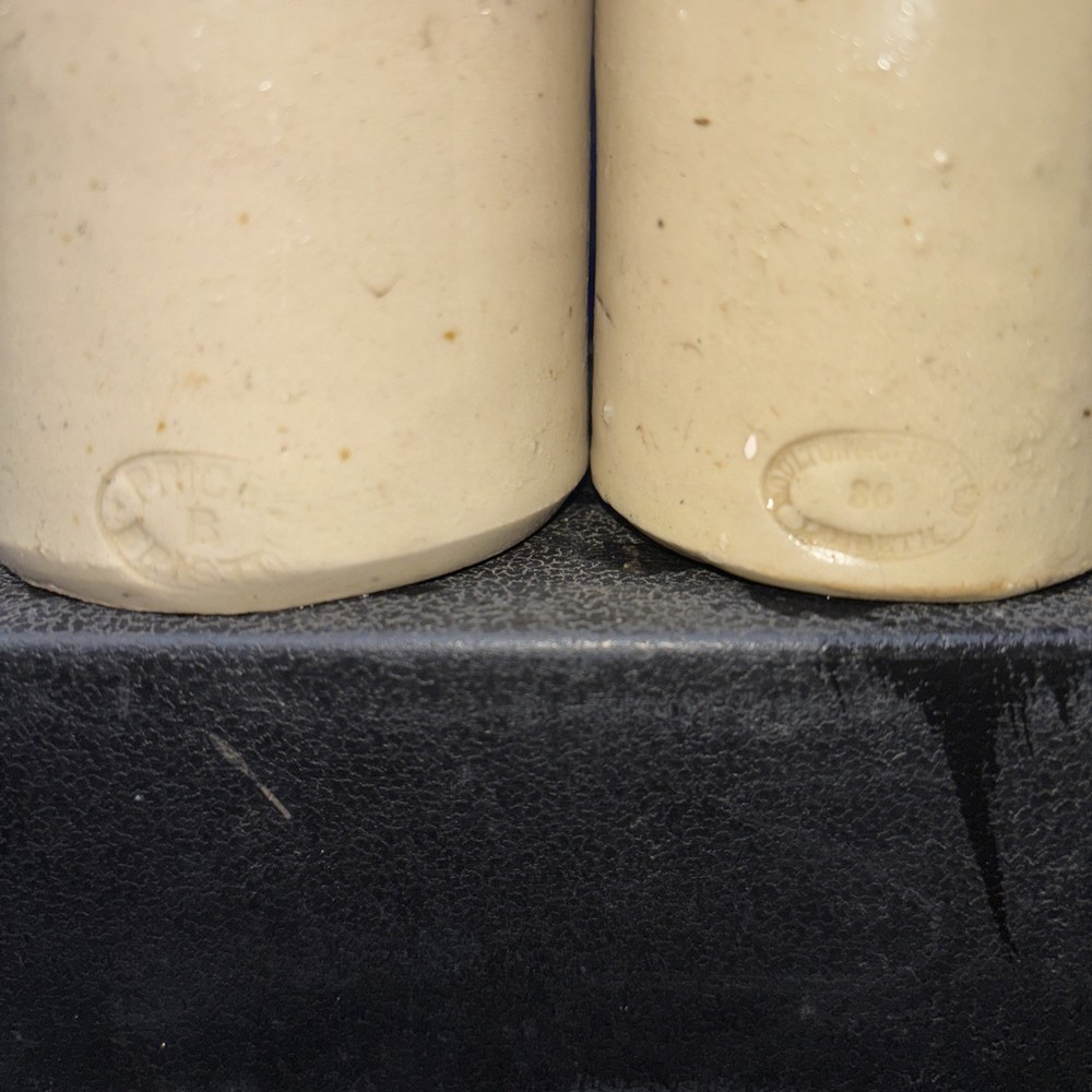 Two small stoneware blacking jars. One solution one price stamped ironstone
