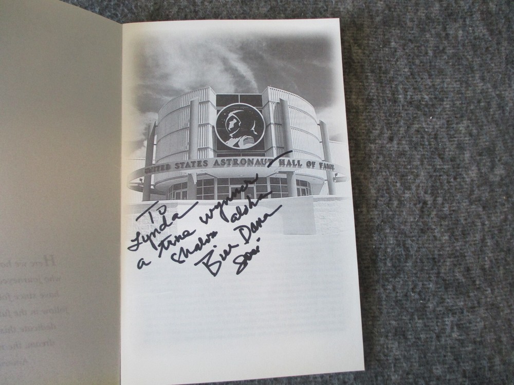 NASA APOLLO ASTRONAUT INDUCTION PROGRAM SIGNED BY WALTER M. SCHIRRA + PEN