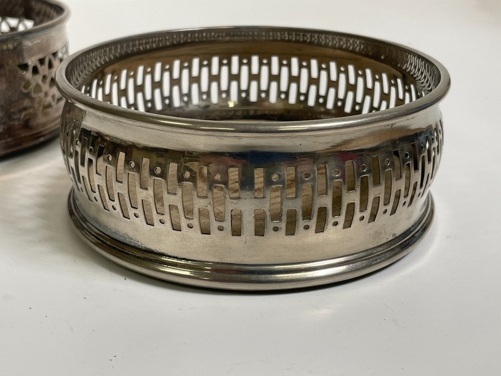 2 Silver Plated Bottle Caster Set Wood Base