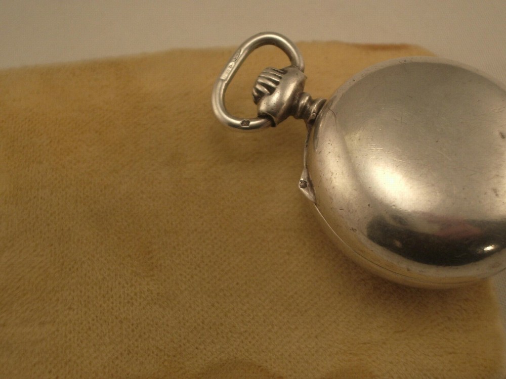 ANTIQUE SILVER COIN HOLDER