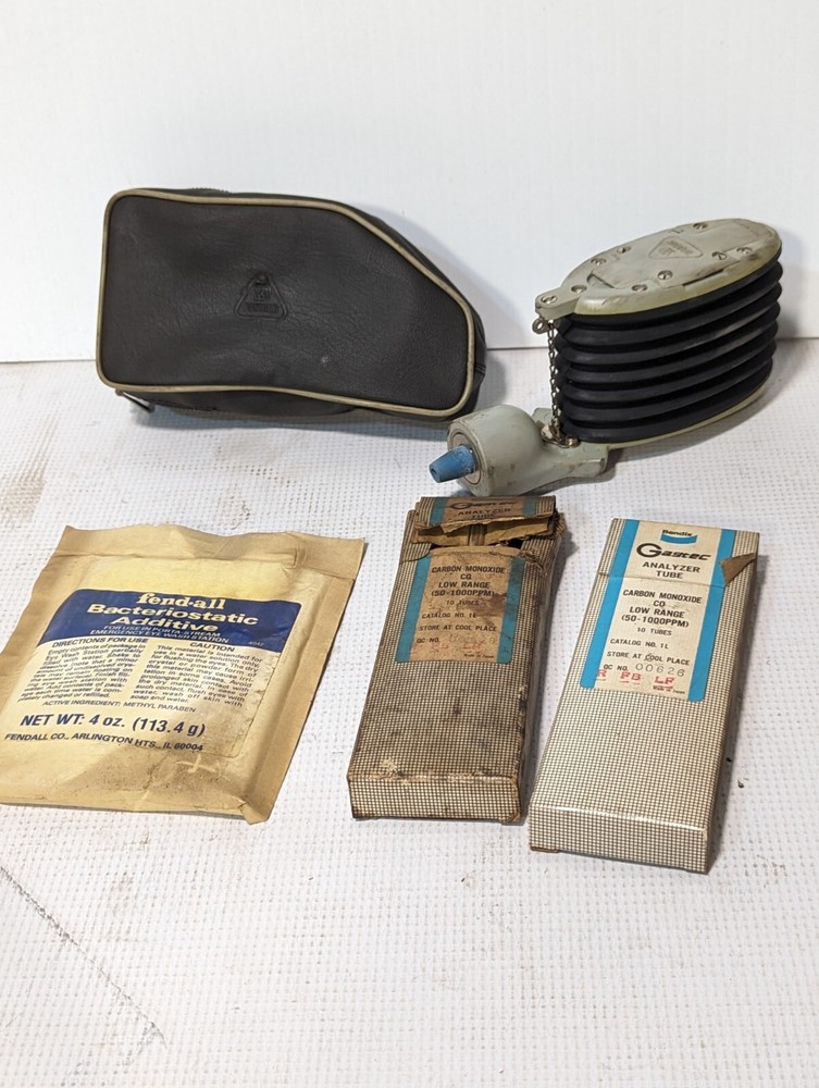 Drager gas detection test pump with case and analyzer tubes as pictured