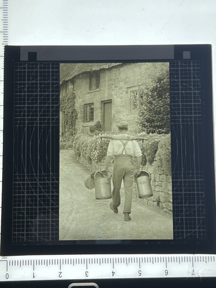 Magic Lantern Slide man carrying milk pails
