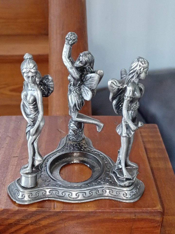 Metal 3 Character Pixie Tealight Holder.