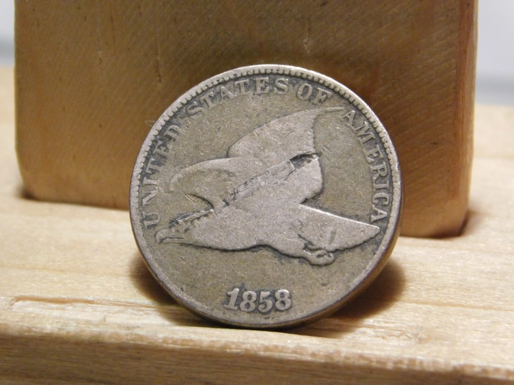 1858 Flying Eagle cent error, lamination across the center