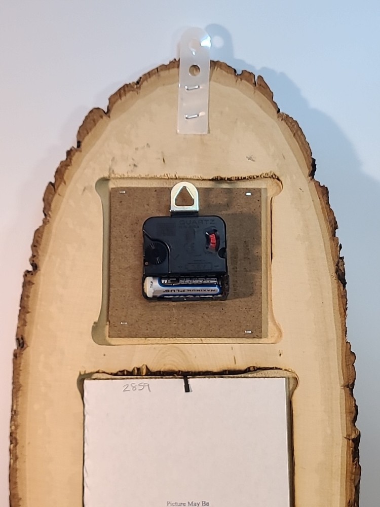 Vintage Laquered Wood Tree Slice Buffalo Clock. Clock Does Not Work.