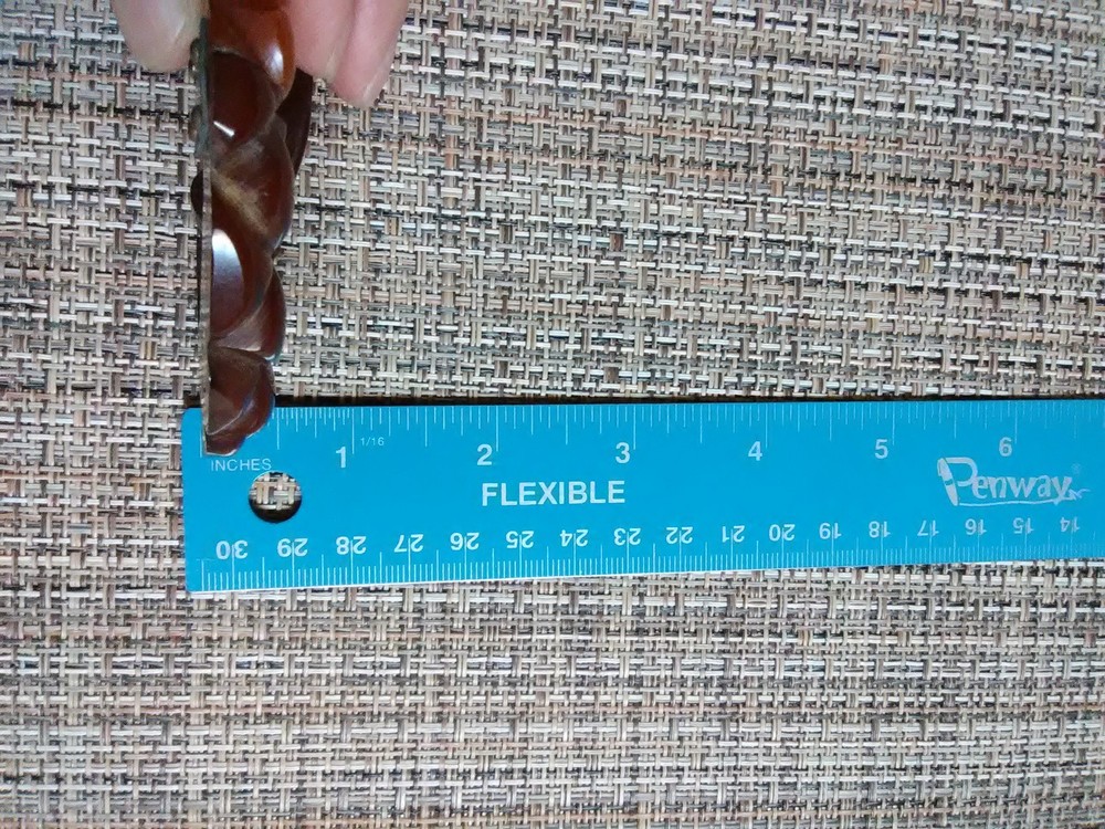 Carved Bakelite buckle