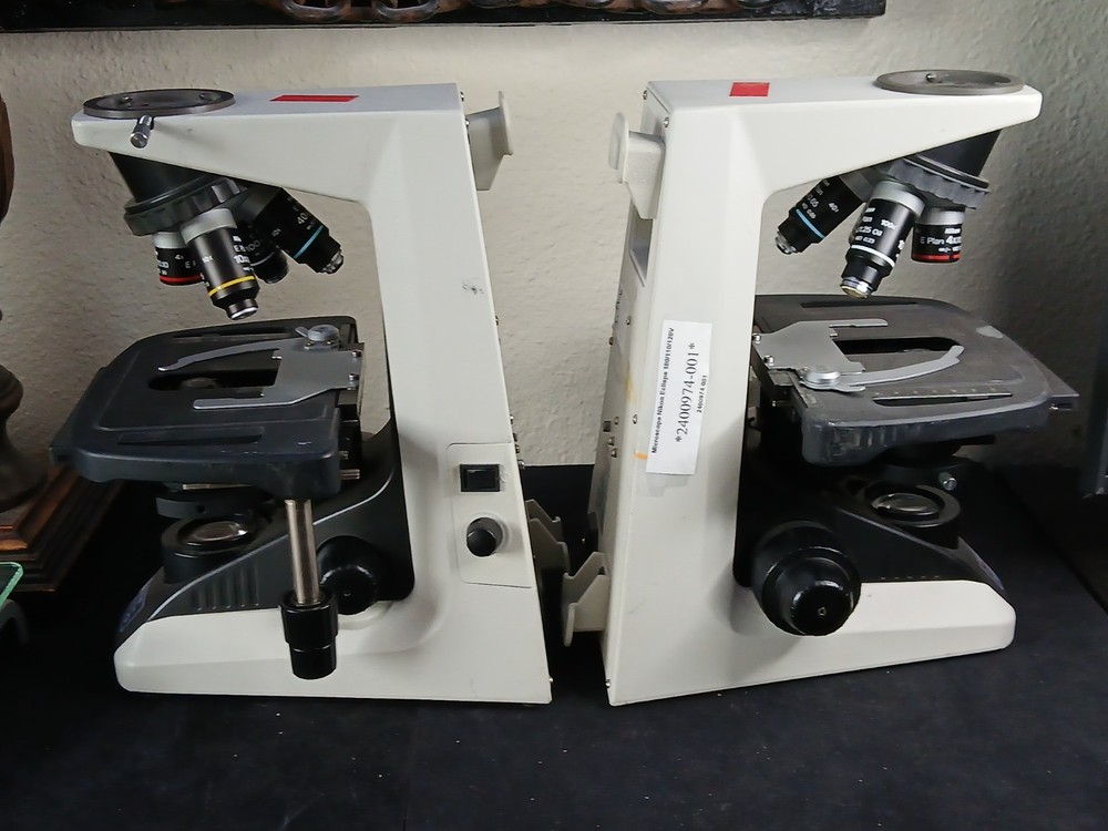 (2) Nikon Eclipse E200 Microscopes & E Plan 4 10 40 100X Oil Sets (No Heads)