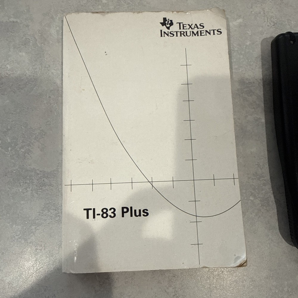 Texas instruments TI-83 plus graphing calculator Used Working with Handbook