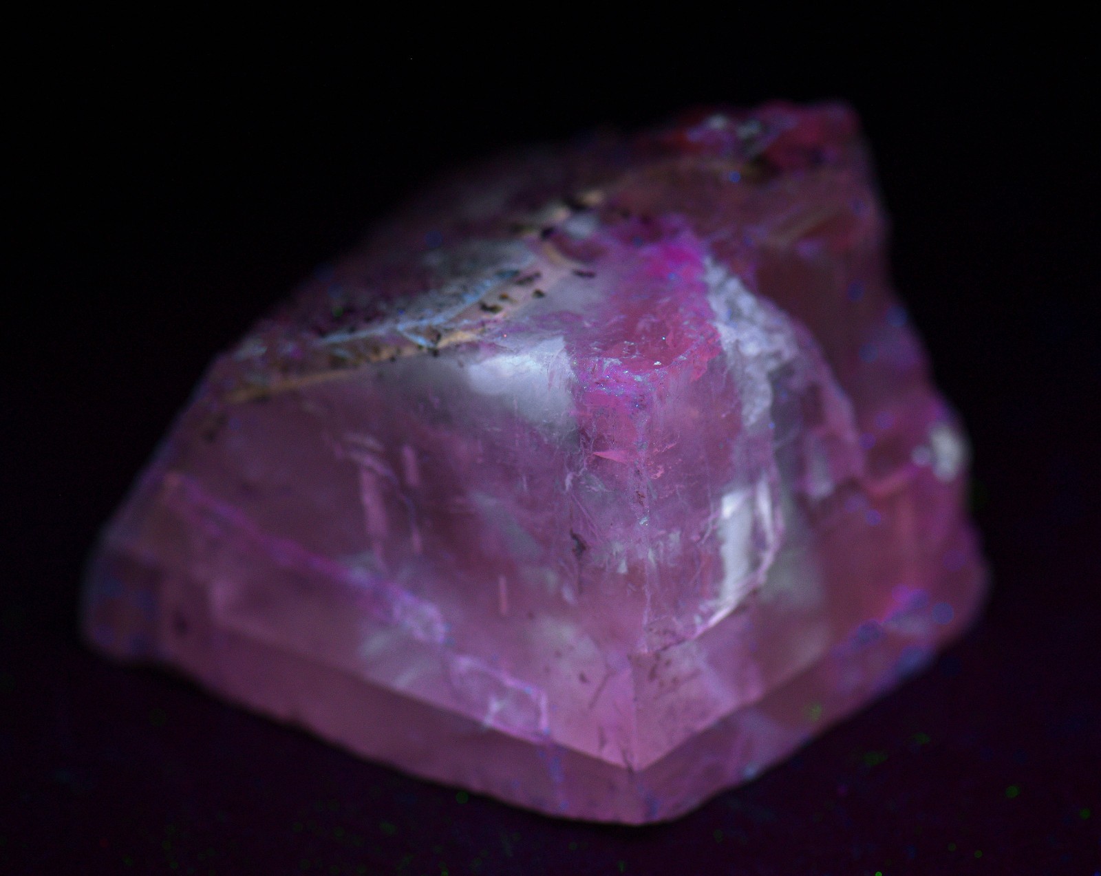 Calcite crystal with Pyrite crystals, fluorescent. Klein Quarry, Iowa. 45 grams.