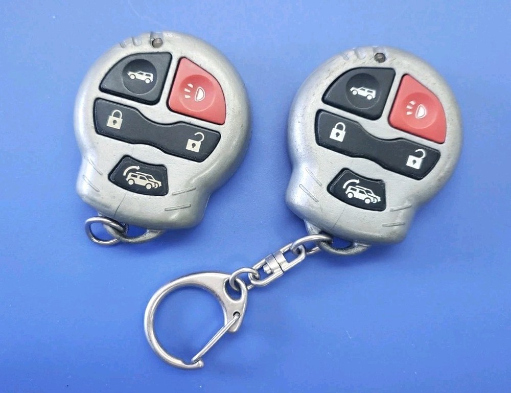 2x USED TESTED WORKING DesignTech ELGTX7 5-Button Remote Transmitter - SILVER