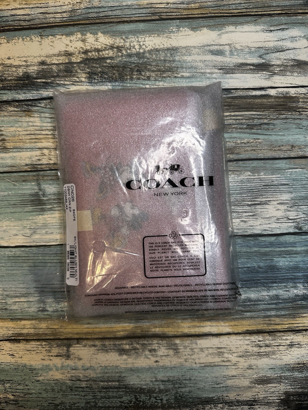 NEW Disney x Coach Corner Zip Wristlet Ice Skate Motif Mickey and Minnie Mouse