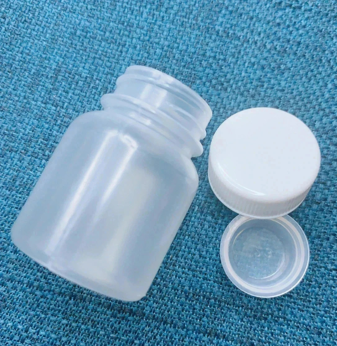 1 dried jasmine leaf on red font yellow blue duong dan don new gre Earrings Smal