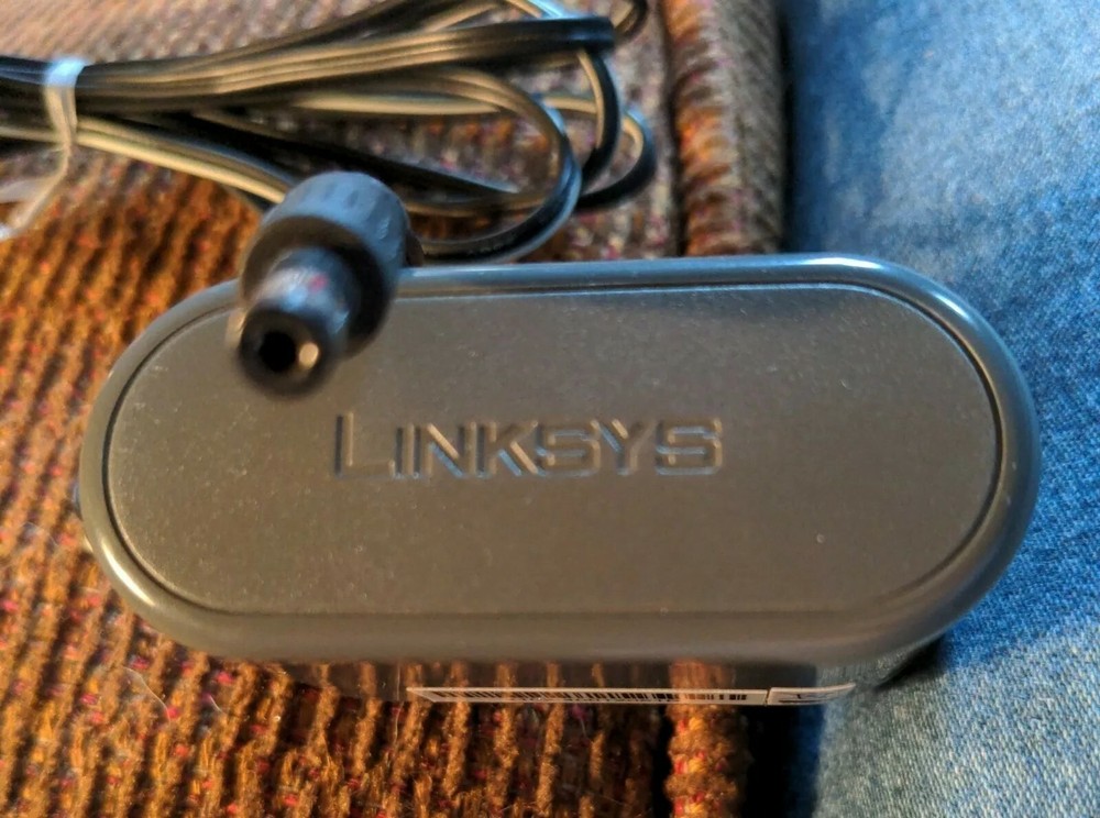 Linksys Adaptor Model AD12V/O5A-SW
