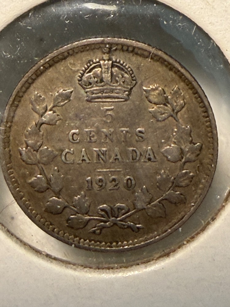 1920 Canadian five-cent coin.
