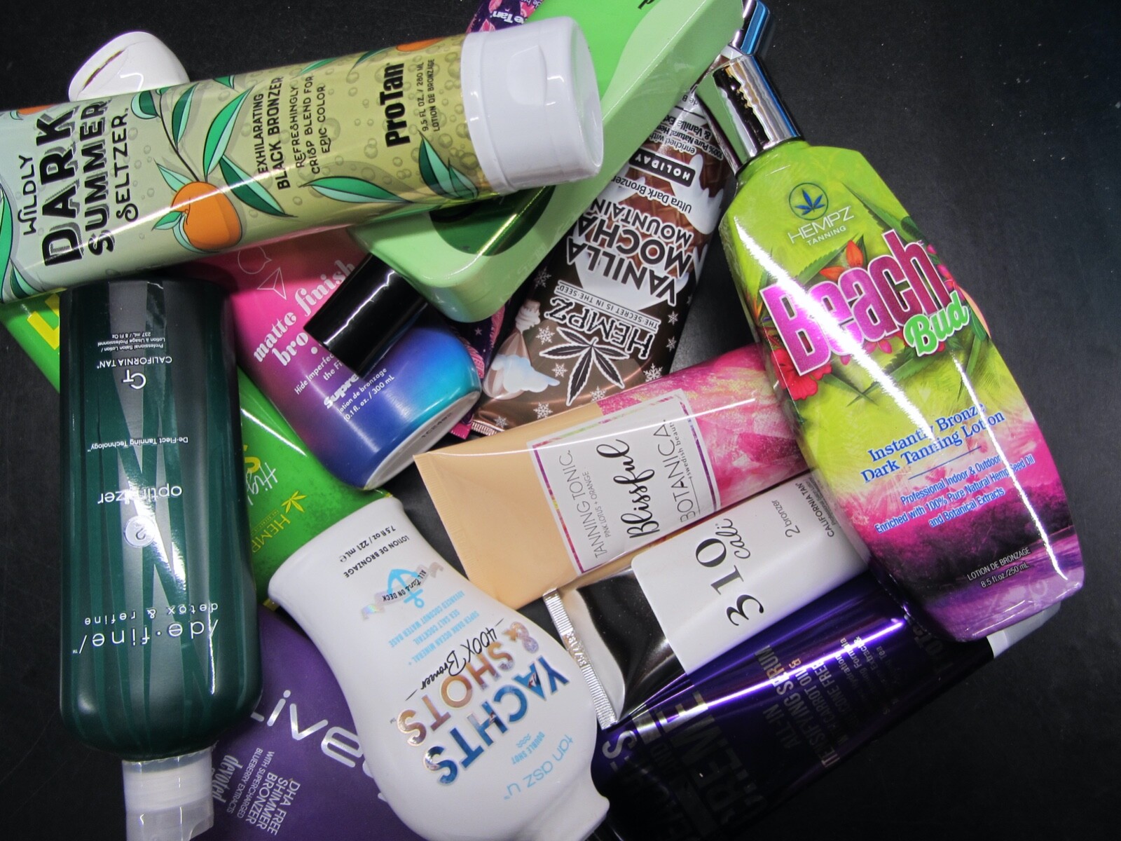 2 NEW, UNOPENED NON-DAMAGED MYSTERY BOTTLES OF TANNING LOTION