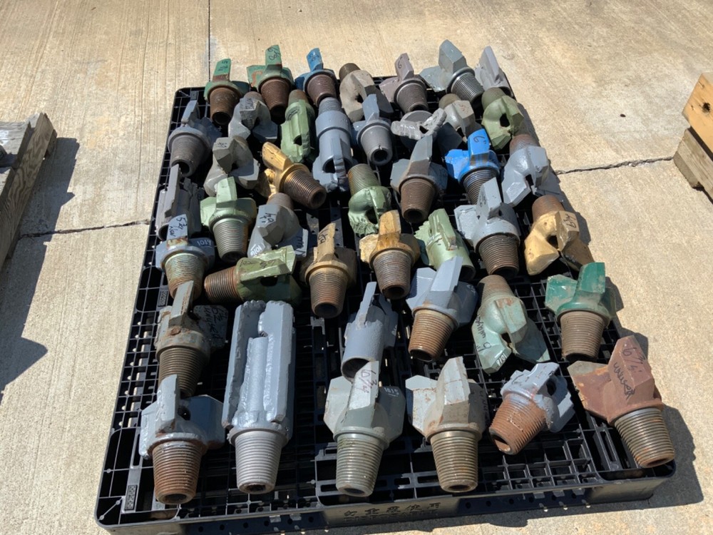 Blade drag bits . Most are new . All sizes