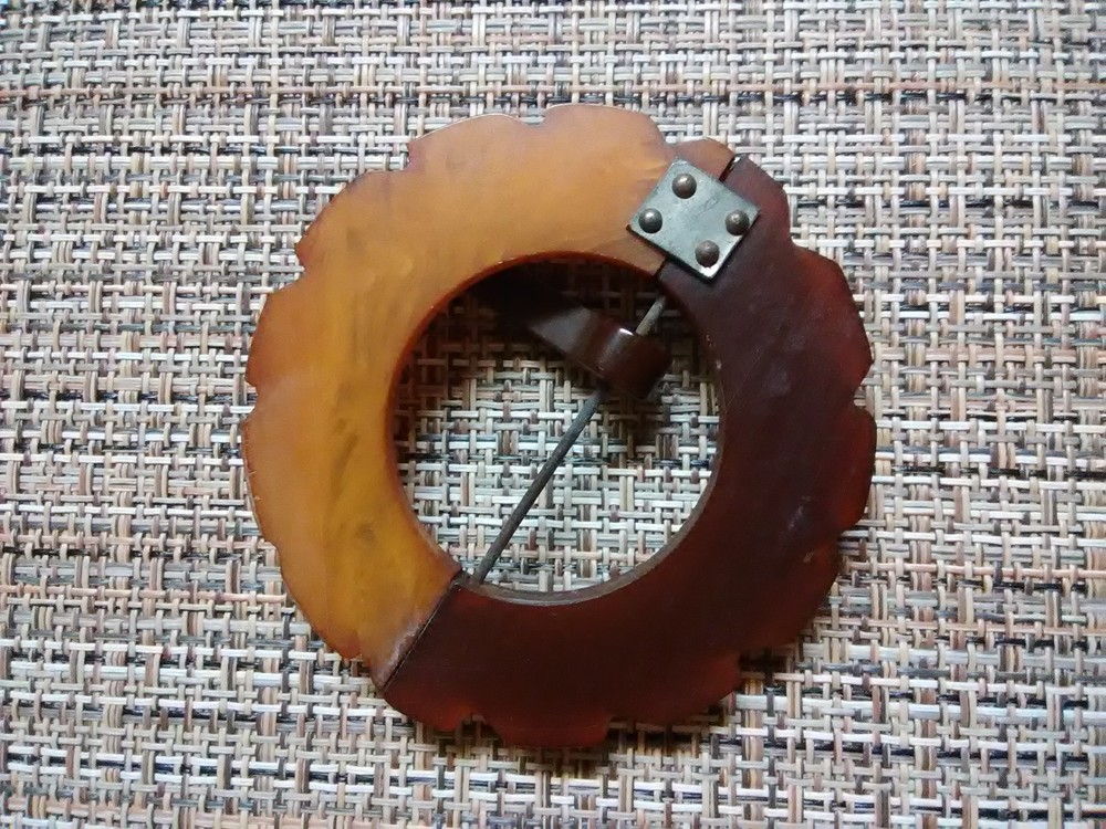 Carved Bakelite buckle