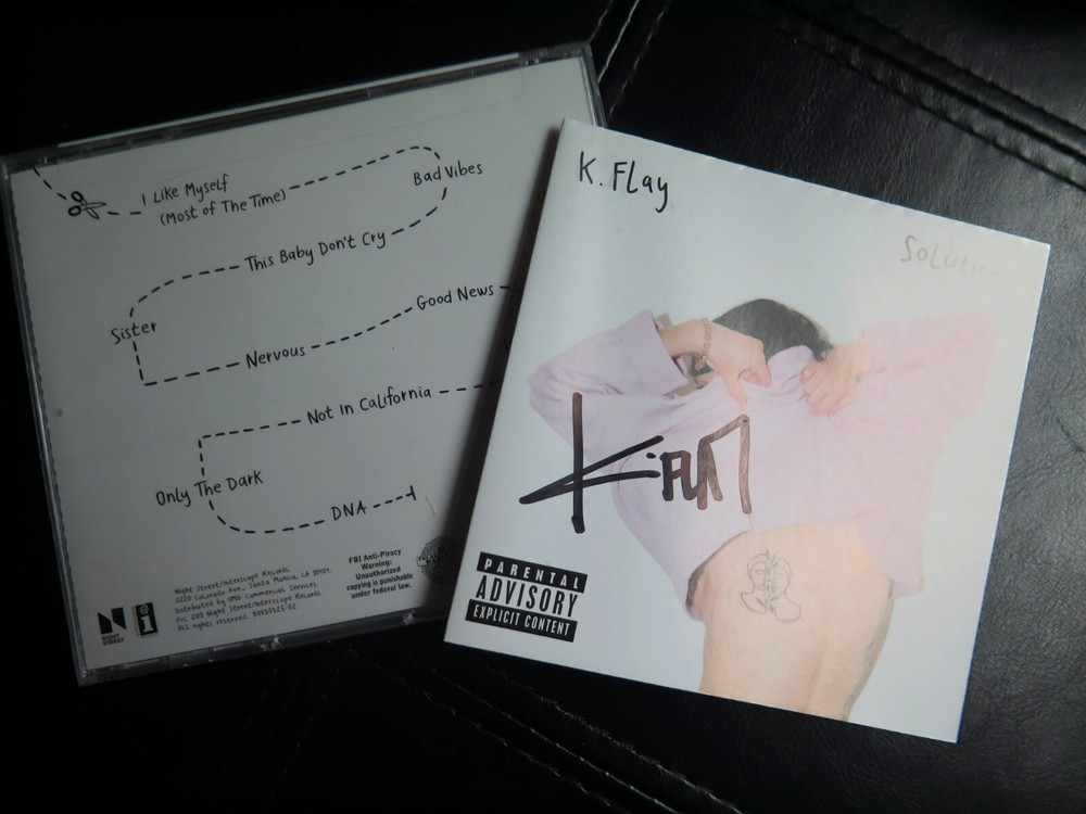 SIGNED by K Flay | Solutions | Sealed CD w AUTOGRAPHED LYRIC INSERT | MINT