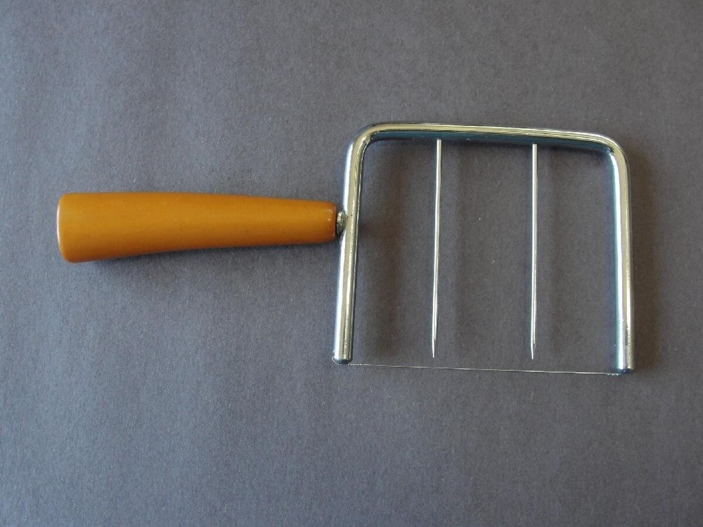 Butterscotch Bakelite Handled Cheese Slicer