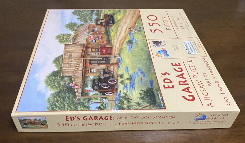 550 pc. SunsOut Ed's Garage Puzzle 2019