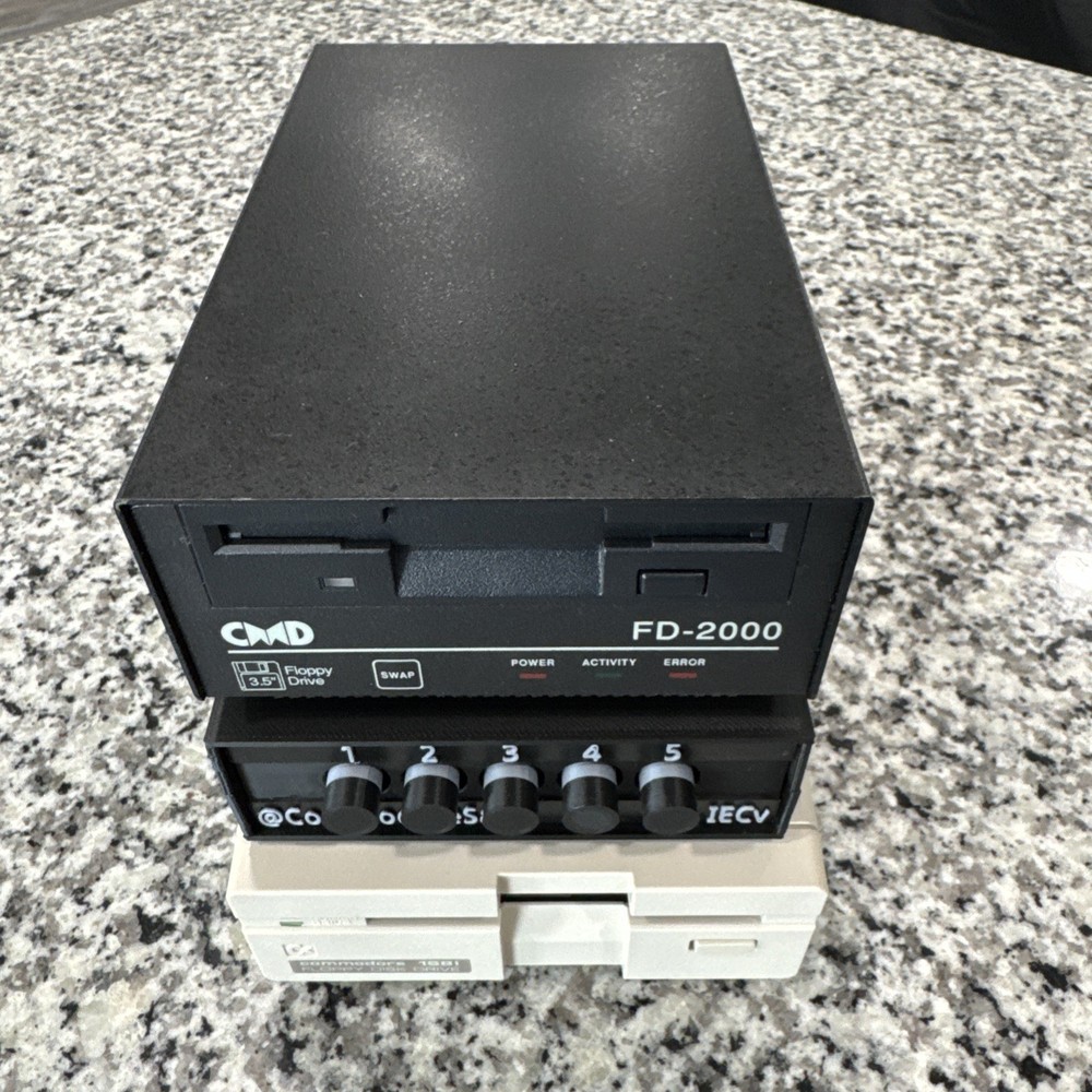 IEC Switch - share disk drives between Commodore 64/128/Vic20/Mega65/X16/OtterX