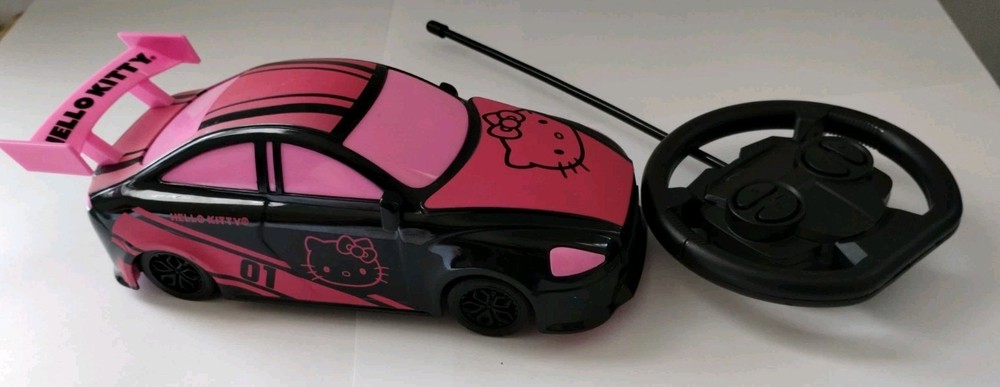 HELLO KITTY REMOTE CONTROL CAR PINK BLACK STEERING WHEEL CONTROLLER