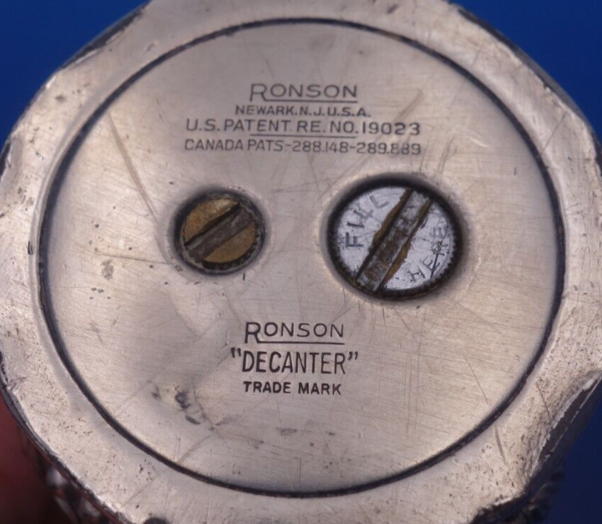 Vintage silver plate decanter lighter by Ronson