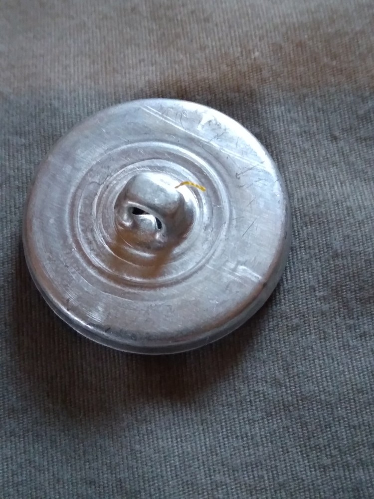 4 Vintage Junque Deco Plastic On Metal Buttons.