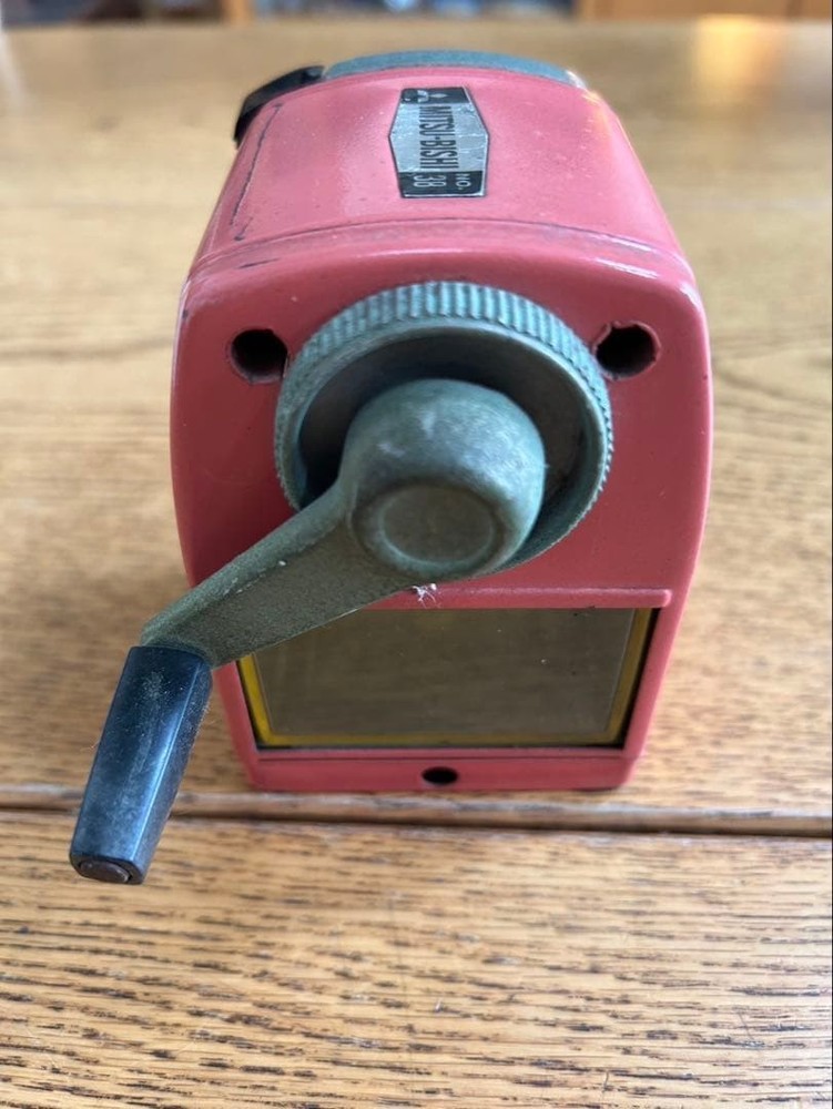 Vintage pink plastic manual pencil sharpener
