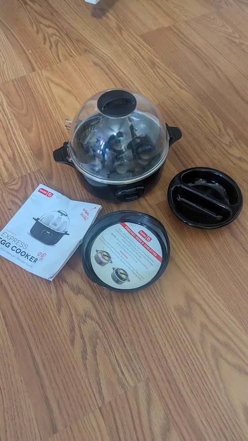 Dash - Express 7 Egg Cooker Model # DEC207 Black - Electric - retractable cord