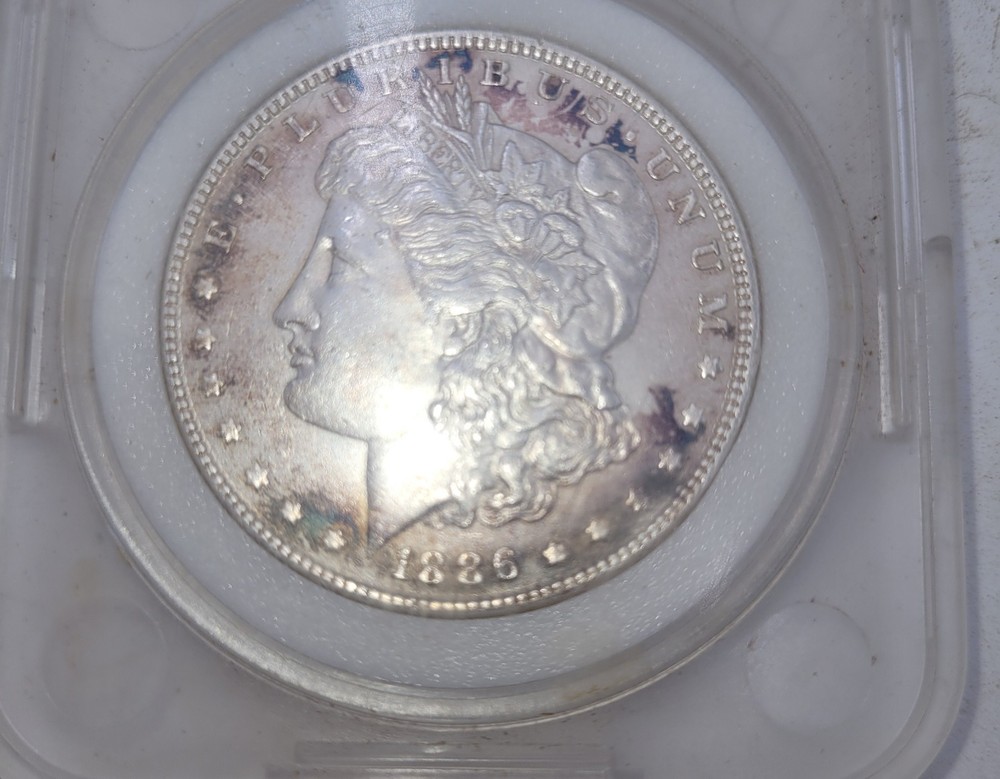 1886 Morgan Silver Dollar – Mint State – 90% Silver – Encapsulated
