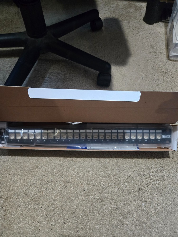 TrippLite Shielded Cat6A Rackmount Feed Through Patch Panel Model N254-024-SH-6A