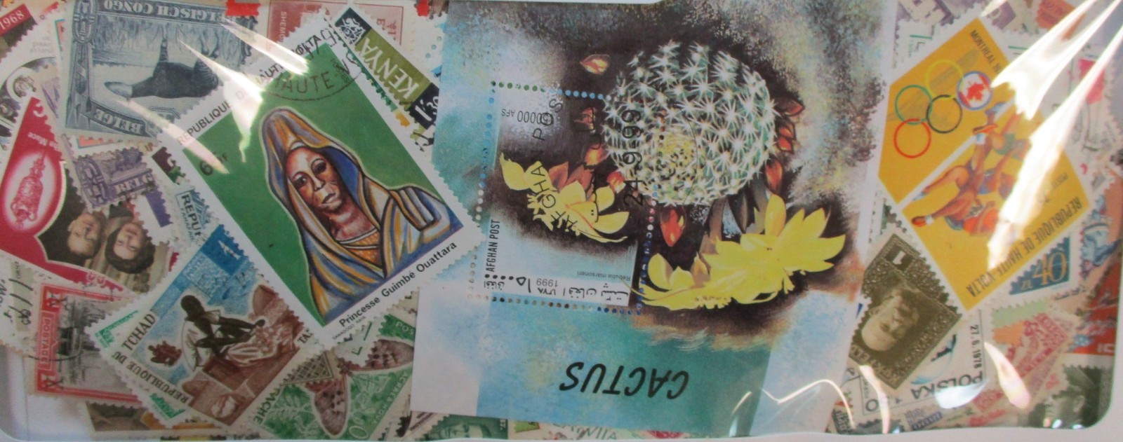 Quality Lot of 1000 Mint/Used Stamps ~ No soaking required!