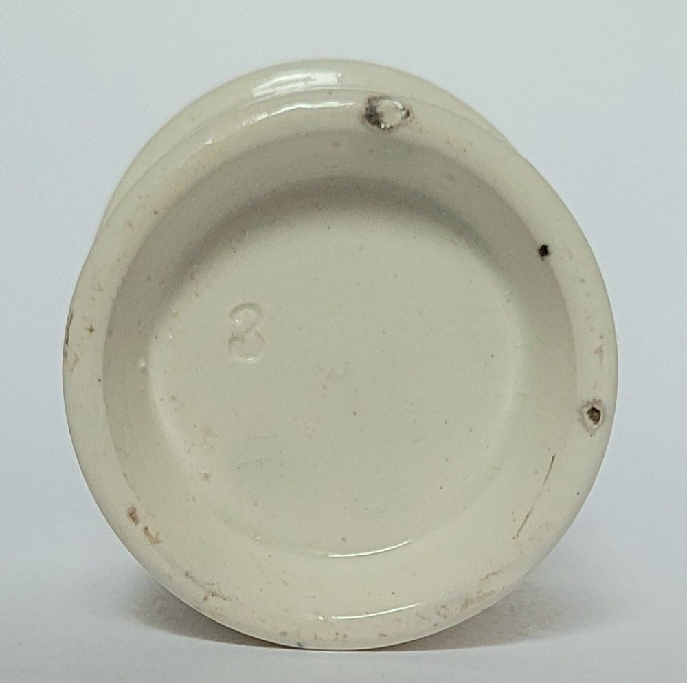 Early perfumers / bears grease pot.