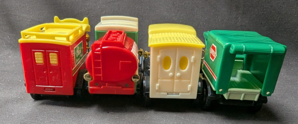 4 Die Cast Vans -