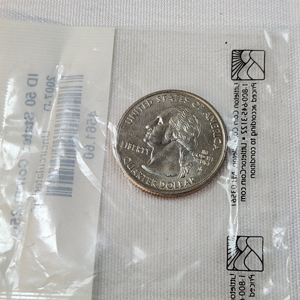 Six Uncirculated State Quarters. See Description