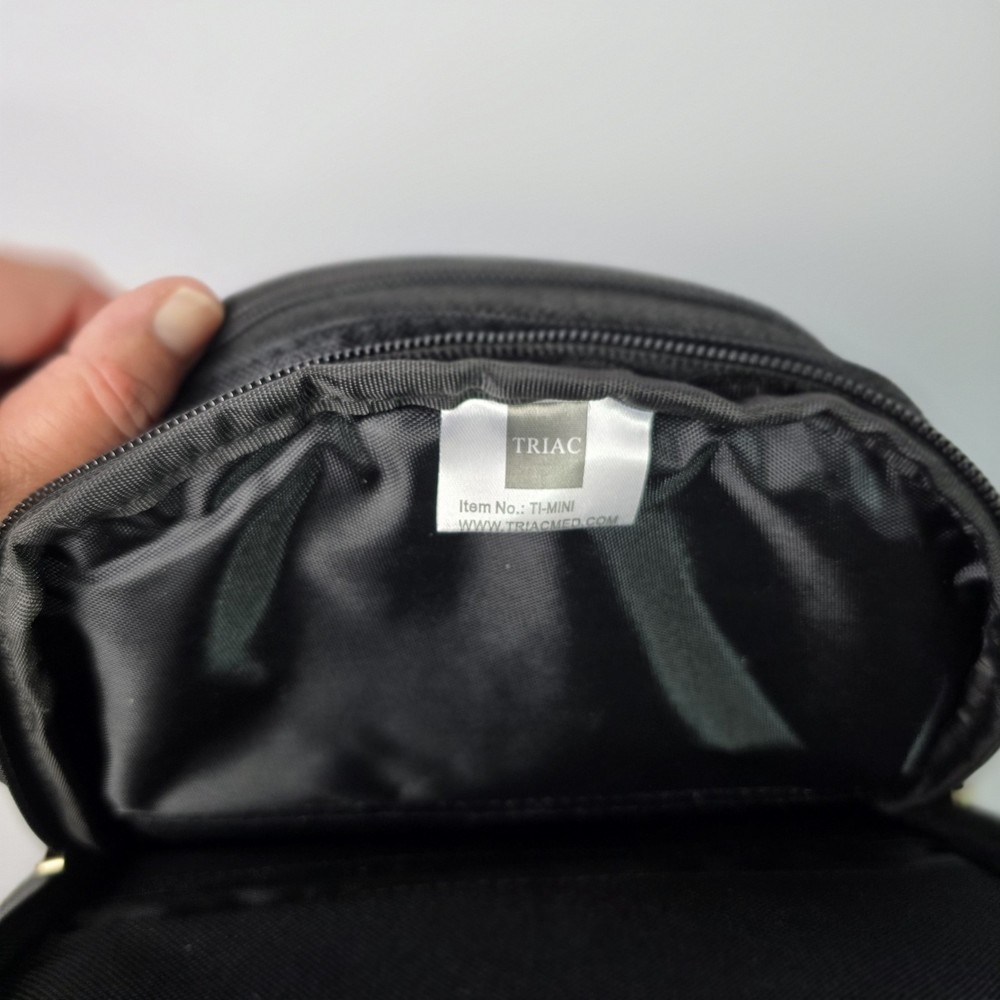 TI Mini Black Backpack Multiple compartments with interior hooks and straps