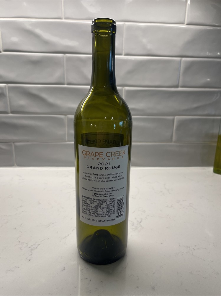 Empty Grape Creek Wine Bottle