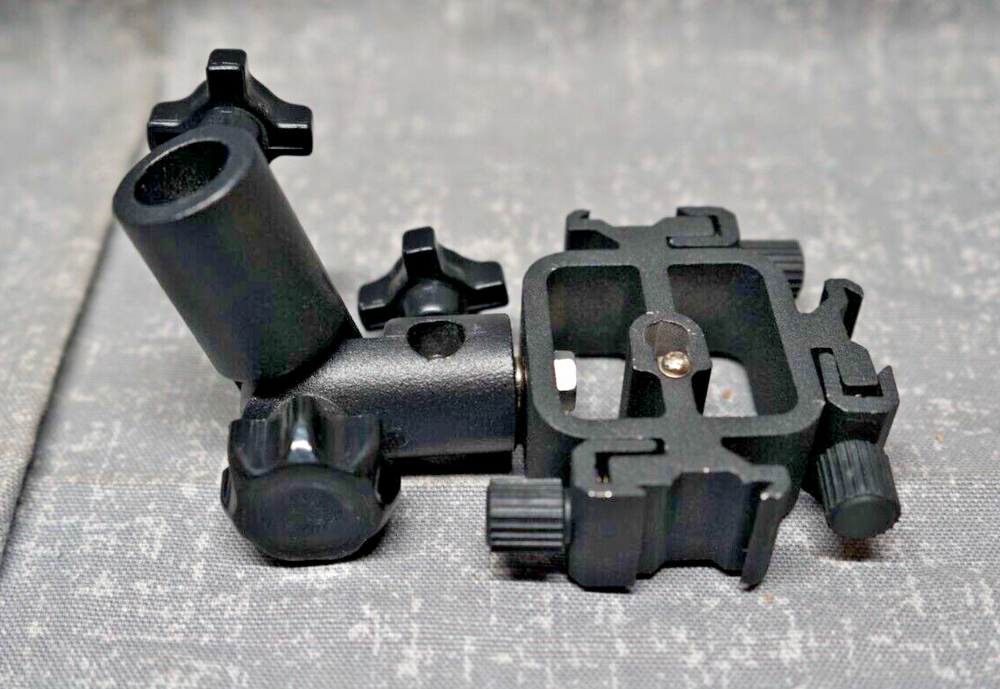 Promaster Triple Shoe Flash Mount Adapter with adjustable light pole mount.