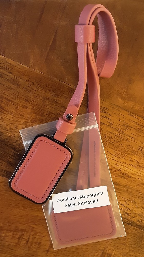 New Tumi Luggage Tag With Additional Monogram Patch in Rosewood Leather 2022.