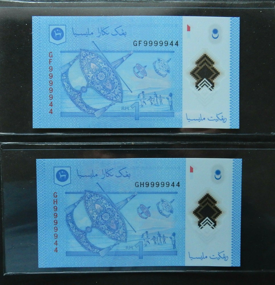 Malaysia $1, 2 notes same serial number, different prefix. Fancy binary 9999944